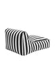 Back view of the Orca Stripe floating lounger showcasing its sleek black and white striped design and ergonomic shape.