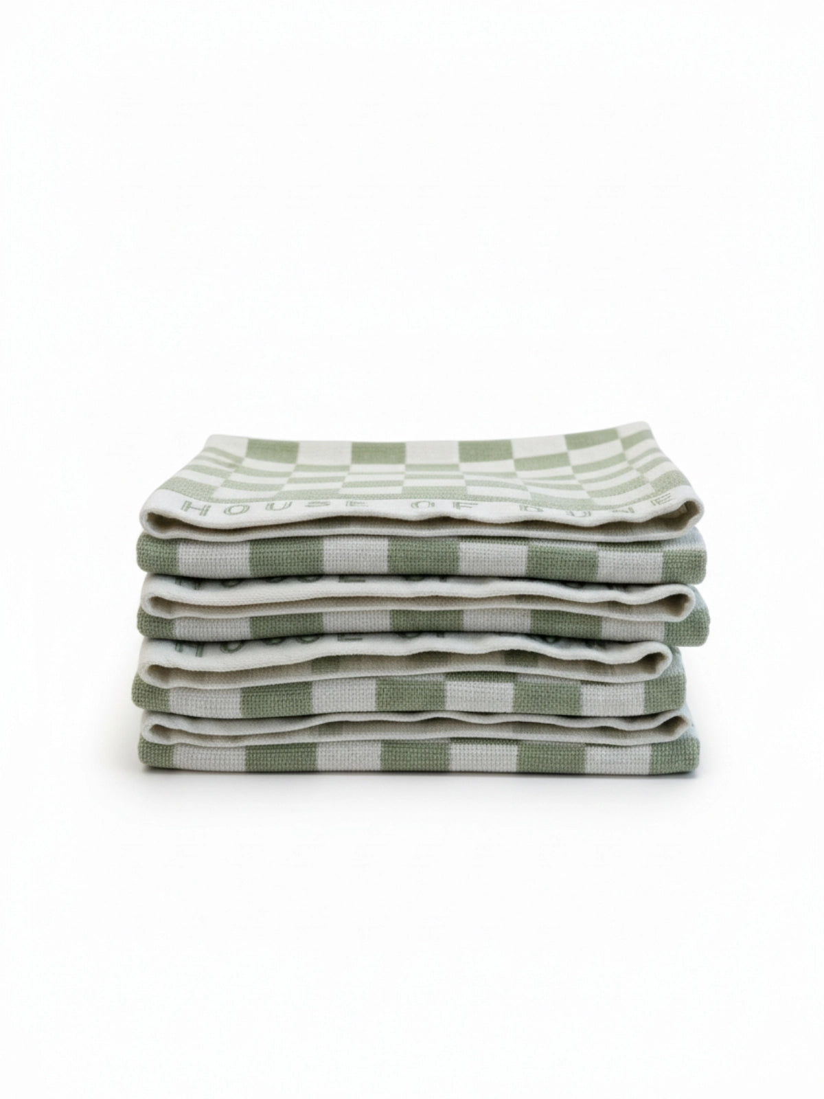 Stack of four House of Dune Salted Sage beach towels in soft green and white checkerboard design, folded for a minimal coastal look.