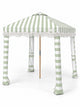 House of Dune Salted Sage beach cabana, three-quarter view on white: sage and white striped canopy with off-white fringe, striped fabric legs and wooden centre pole.