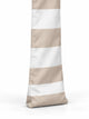 Foot of a House of Dune Sand Drift cabana leg: soft sand and white striped fabric with a stitched base that sits on the sand.