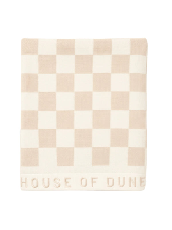 Folded Sand Drift checkered towel from House of Dune, highlighting its premium cotton weave and minimalist style.