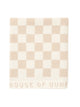 Folded Sand Drift checkered towel from House of Dune, highlighting its premium cotton weave and minimalist style.