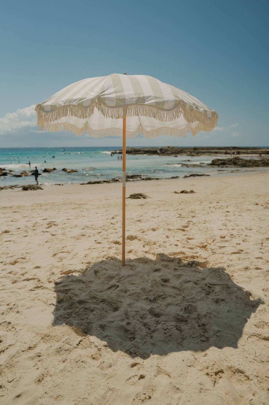Sand Drift Beach Umbrella on the beach by the sea