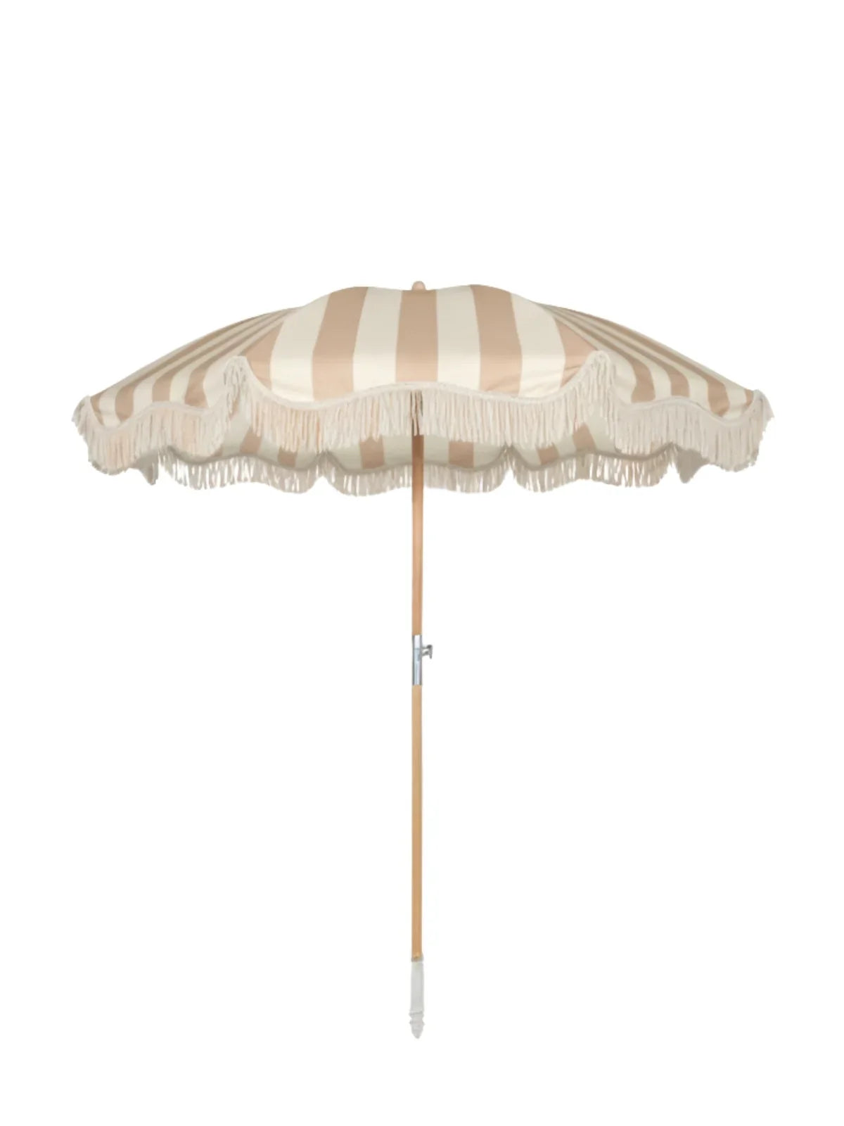 Upright Sand Drift beach umbrella from House of Dune with neutral beige and cream stripes, wooden pole, and fringe edging.